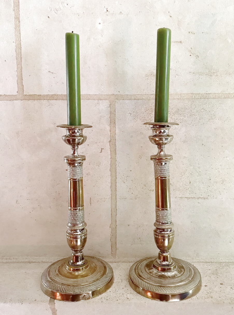 A pair of French Empire Candlesticks